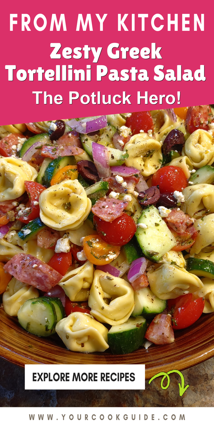 Zesty Greek Tortellini Pasta Salad served warm with cozy spices